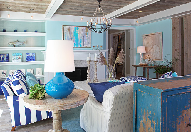 Living Room. Coastal Home Living Room. Coastal Home Living Room Decorating Ideas. Vibrant ocean colors bring a seaside feeling to this coastal living room. #Livingroom #Coastal #Interiors Letitia Little.