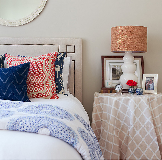 Bedroom. Casual Coastal Bedroom Decor. Casual bedroom with Serena & Lily Octavia Headboard, white scalloped round mirror, white gourd lamp, skirted table nightstand and blue ikat pillows. #Bedroom #CasualBedroom #BedroomDecor #CoastalBedroom Jenny Wolf Interiors