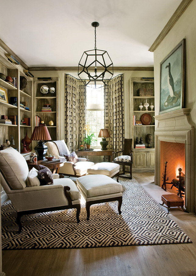 Study. Cozy study with bookcases and fireplace. Flooring is a ceruse wood finish, and they used ROMA's LowCer stain, Biocalce Classico, Terramare Velatura, and Peter Block Architects and Interior Designer, Beth Webb Interiors.