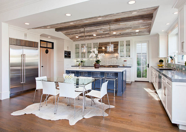 Transitional Kitchen with reclaimed wood ceiling. Transitional kitchen with white cabinets, blue kitchen island, coastal pendant lighting. Pendants are the Andover by Ralph Lauren. #kitchen #transitionalKitchen #ReclaimedCeiling