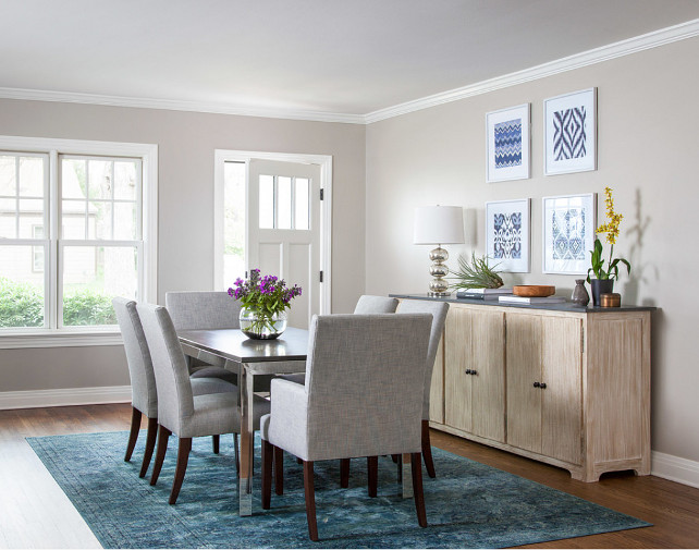 Dining Room Wall and Trim Paint Color. Dining Room Wall and Trim Paint Color Ideas. The wall paint color in this dining room is Revere Pewter by Benjamin Moore. The trim and door paint color is Simply White by Benjamin Moore. #ReverePewter #SimplyWhite