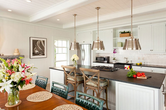 Coastal Kitchen Design Ideas. This coastal is beautifully designed with white cabinets and Soapstone Countertop. #Kitchen #CoastalKitchen