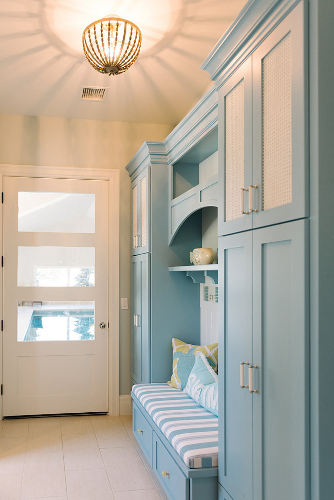 Mudroom Cabinet and wall paint color combination. The mudroom cabinet paint color is Benjamin Moore Marlboro Blue HC-153 and Benjamin Moore White Dove OC-17. The mudroom wall paint color is Benjamin Moore Cool Breeze CSP-665. 