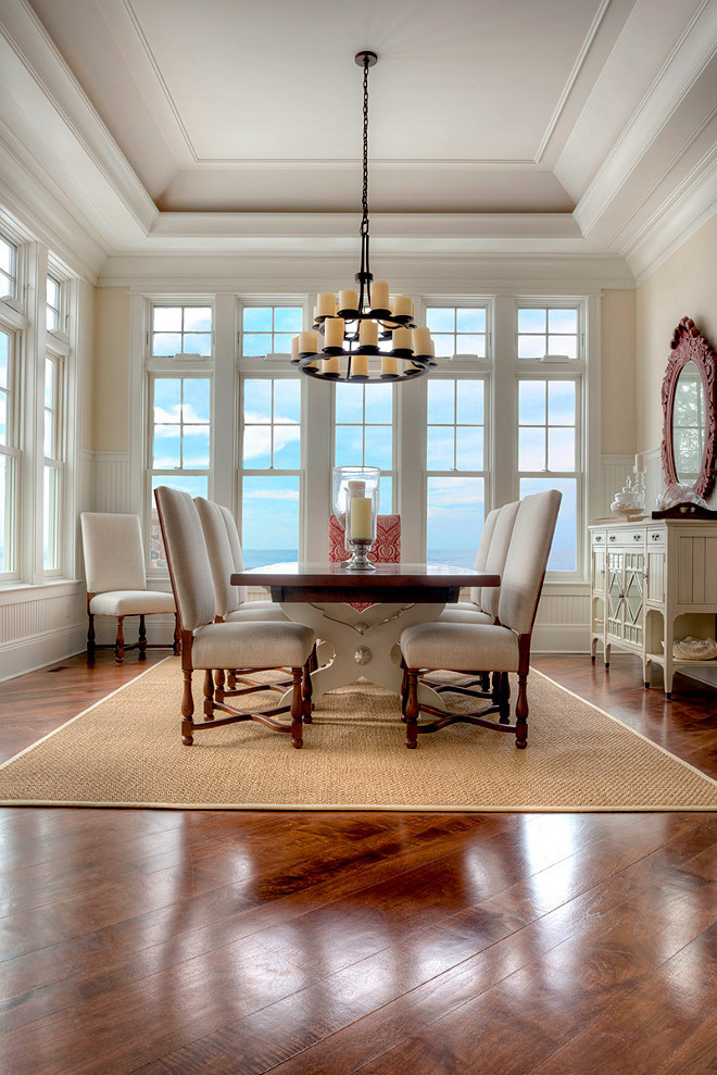 Dining Room Hardwood floor stain color and finishes. The new dining room hardwood floors were stained in a warm walnut color. #DiningRoom #HardwoodFloor #Stain #Color #Finishes Grand Estates Auction Company.