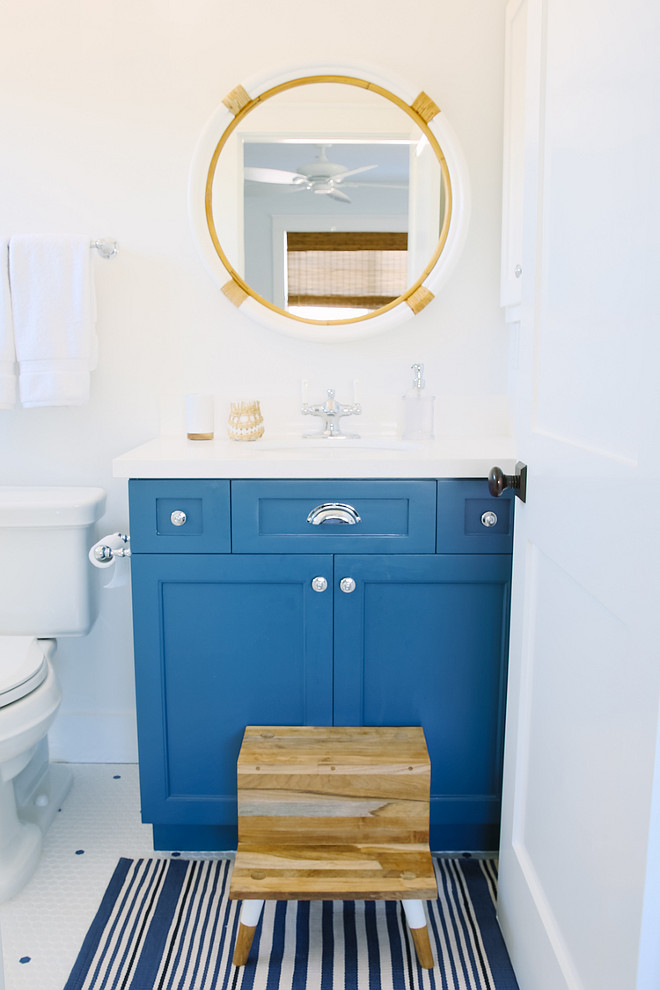 Blue Bathroom Vanity. Kids bathroom with blue vanity. The kids step stool is by Serena and Lily Montara Mirror above blue vanity is also from Serena and Lily. #Bathroom #BlueVanity #kidsBathroom Rita Chan Interiors.