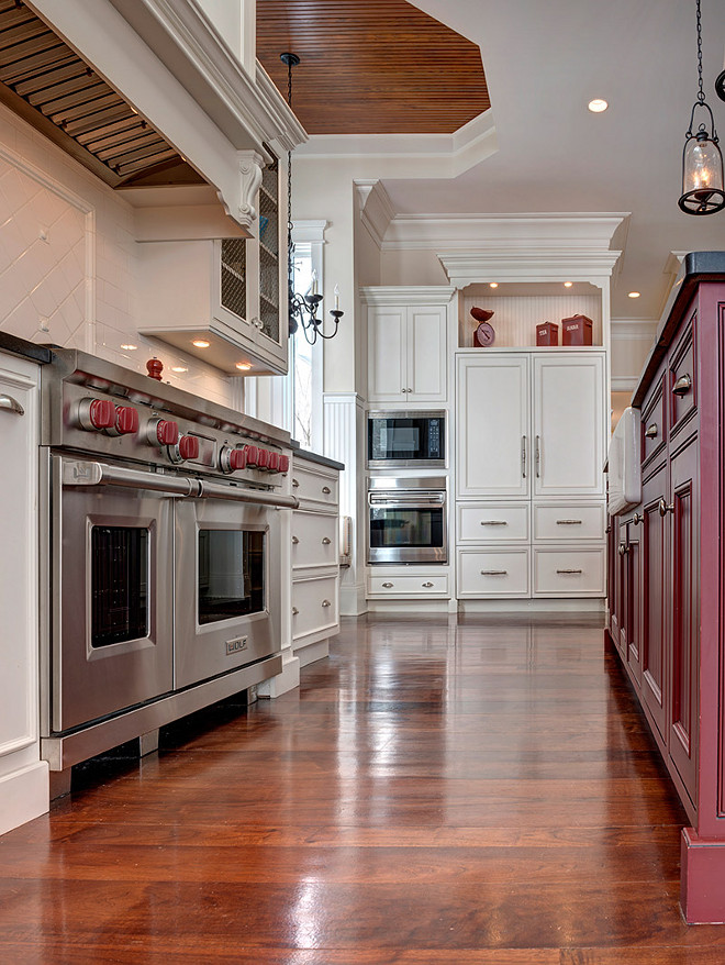 Kitchen Flooring. Kitchen Hardwod Flooring. Off-white kitchen hardwood flooring stain ideas. #OffwhiteKitchen #HardwoodFlooring #Stain #Color Grand Estates Auction Company.