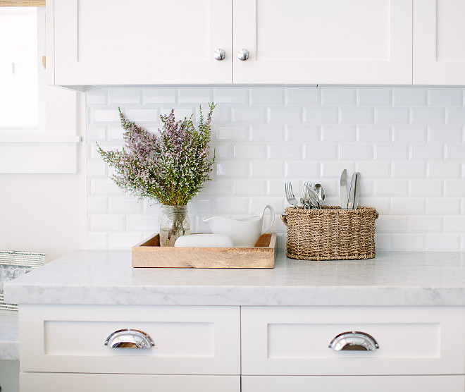 Kitchen carrara marble and Beveled 2x4 White Subway Tile backsplash. Beveled 2"x 4" White Subway Tiles. #carraramarble #beveledsubwaytile #backsplash #kicthen Rita Chan Interiors.