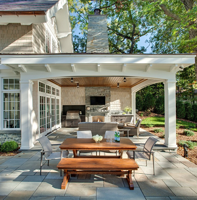 Patio. Combination of open patio and covered patio with outdoor kitchen and outdoor fireplace. #patio John Kraemer & Sons.