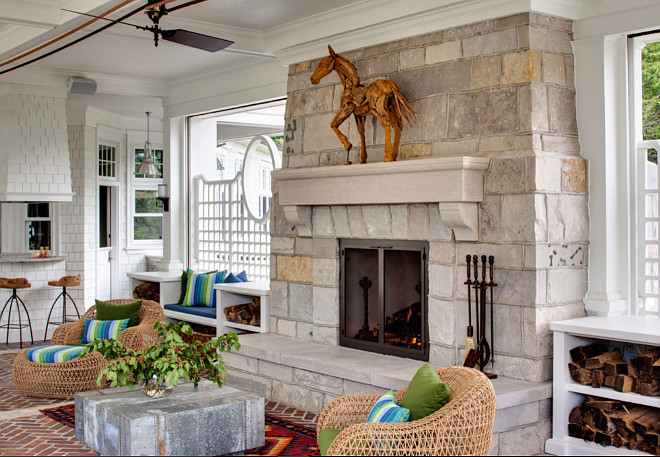 Porch Fireplace. Porch Fireplace Design Ideas. Porch with stone fireplace and built in benches on both sides. #porch #fireplace Wade Weissmann Architecture. David Bader Photography.