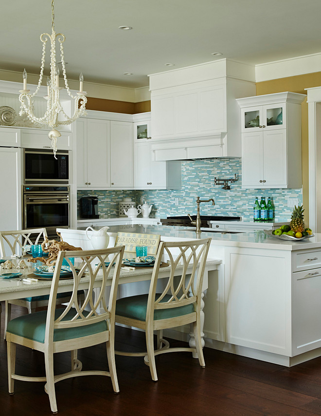 Turquoise Kitchen. White and turquoise kitchen. Coastal Turquoise kitchen. White kitchen with turquoise decor. #KItchen #Turquoise JMA Interior Design.