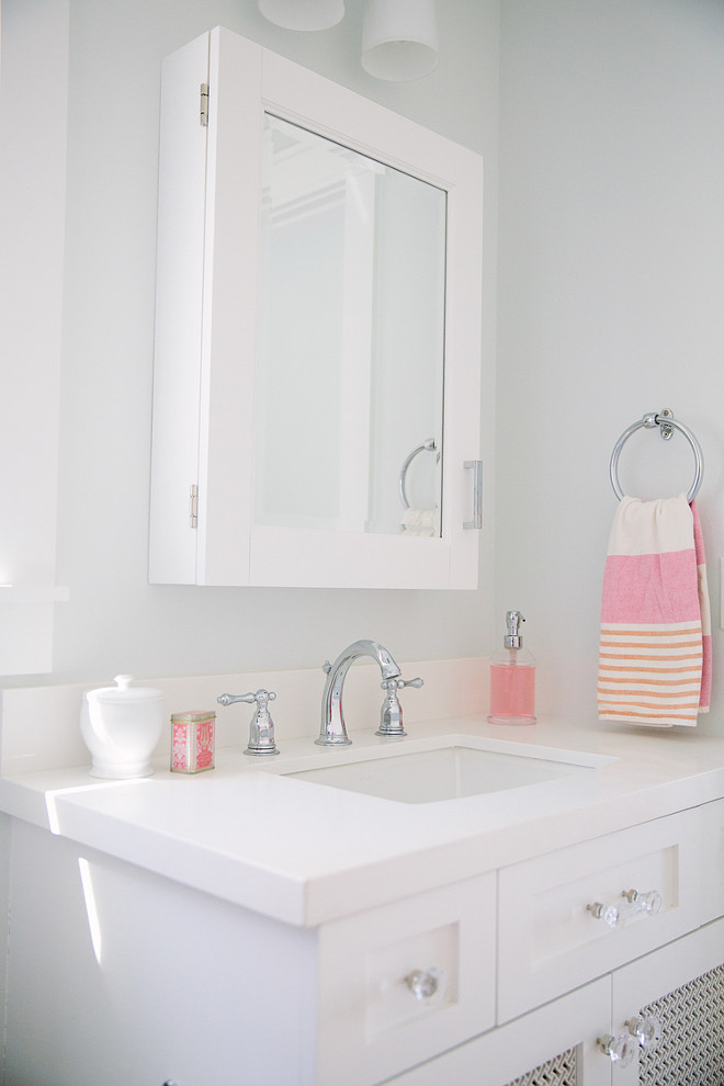 White bathroom with white medicine cabinet. #Whitebathroom #MedicineCabinet #Bathroom Rita Chan Interiors.