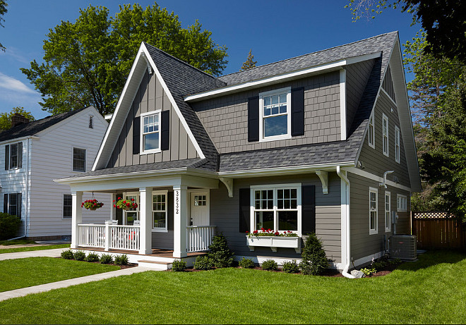 Cape Cod Home Paint Color. Cape Cod Home Exterior Paint Color. Cape Cod Home Exterior Paint Color Ideas. This Gray Cape Cod Home Exterior Paint Color is James Hardie lap siding in the Aged Pewter prefinished color. #CapeCod #PaintColor Anchor Builders.