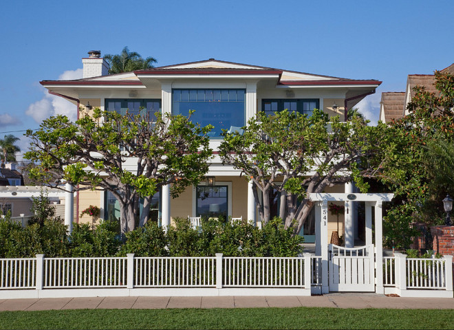 Yellow House Exterior Paint Color. Yellow House Exterior Paint Color Ideas. The exterior paint color of this home is Benjamin Moore 198 Cornsilk. #BenjaminMoore198 #BenjaminMooreCornsilk #Yellow #Exterior #PaintColor 