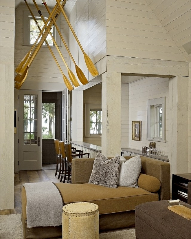 Beach house foyer. Beach house foyer with boat oars on ceiling. #Beachhouse #oars Hickman Design Associates.