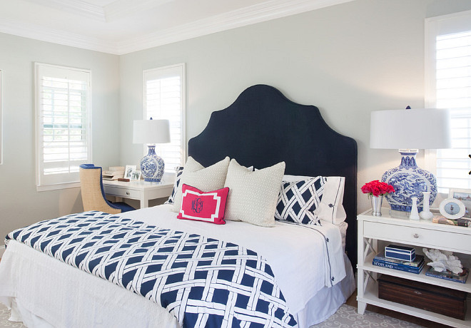 Blue and white bedroom with navy headboard. Bed is dressed in navy and white bedding. #Blueandwhite #Bedroom #Navy #Headboard AGK Design Studio.