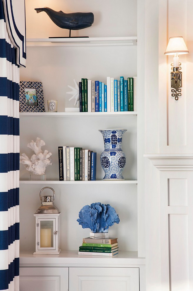 White Bookcase Paint Color. The white bookcase paint color is Sherwin Williams Pure White SW7005. This white paint color is a great crisp white that I often recommend to my own clients. You can use this crisp white on cabinets, but it is also perfect from trim work. 