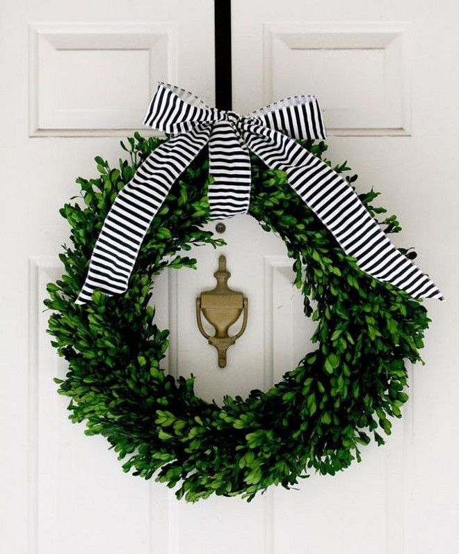 Christmas Wreath. Front door Christmas Wreath. Front door Christmas Wreath with simple striped black and white bow. #Christmas #Wreath By CRANE CONCEPT.