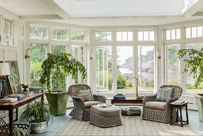 Conservatory Decor Ideas. Beautiful conservatory with garden and river view. The classic rattan wicker chairs can be used in both interior and exterior spaces and they are by gloster.