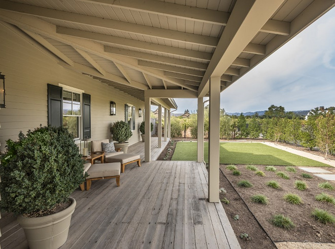 Front Porch. Wrap-around porch ideas. Wrap-around porch styles. Wrap-around porch design. Farmhouse Wrap-around porch. #Farmhouse #Wraparoundporch #porch Sotheby's Homes.