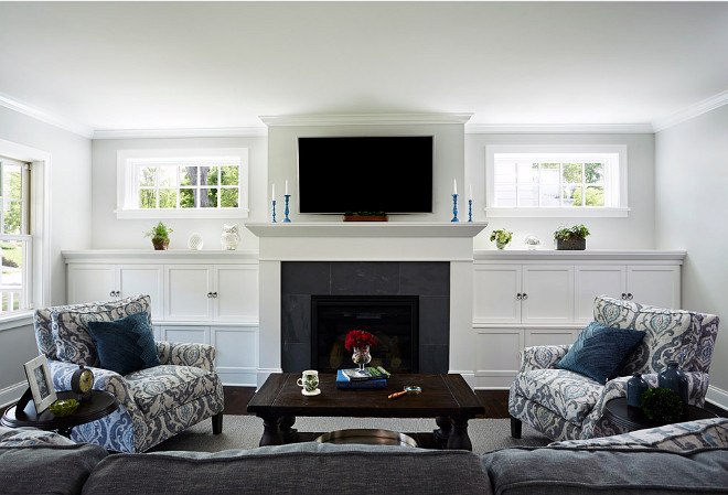 Living Room with windows above fireplace cabinet. #Livingroom #fireplace #Cabinet #windows Anchor Builders.