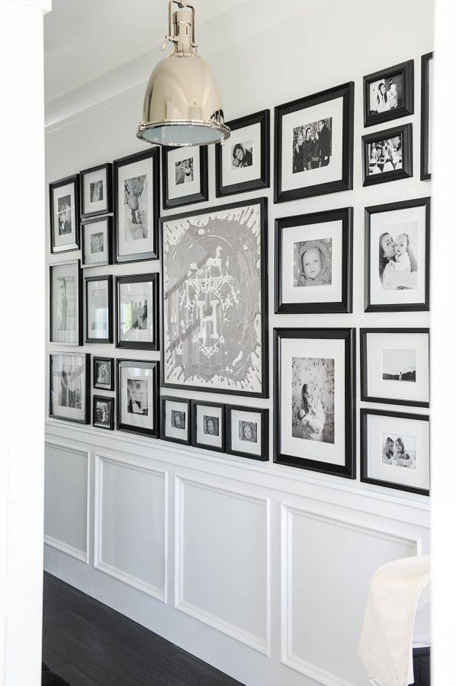 Photo Gallery Wall. Hallway Foyer with Photo Gallery Wall. Black and white Photo Gallery Wall. #PhotoGalleryWall Monika Hibbs.