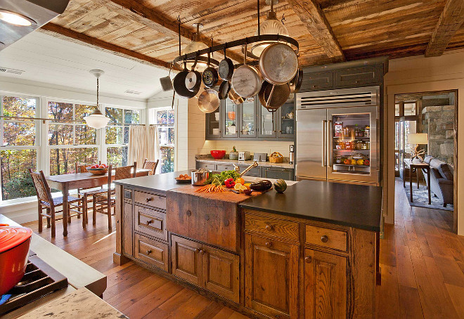 Rustic Kitchen. Rustic Kitchen Design. Rustic Kitchen Island. Rustic Kitchen Island Butchers Block. The cabinets of this rustic kitchen and the island are made of antique oak.