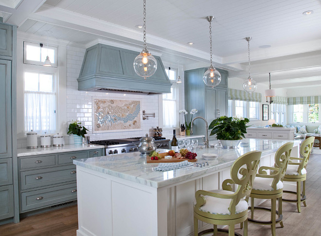 The Kitchen Cabinet color is custom Blue with a glaze by Phillips Painting; The Kitchen Island is Dove White by Benjamin Moore.