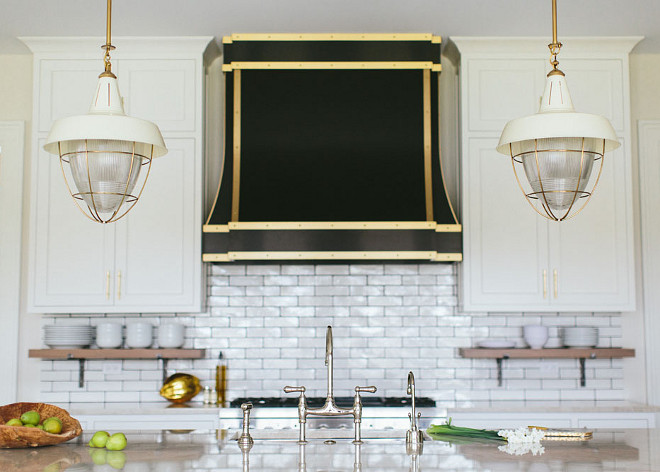 Kitchen Backsplash Tiles. Transitional kitchen subway tile backsplash with dark grout and open shelving beneath cabinets. Backsplash is Bison Brick in White. #kitchen #backsplash #tiles #whitetiledarkgrout #kitchenbacksplashtiles Kate Marker Interiors. 