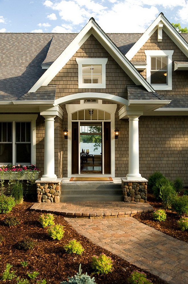 Arched Entry. Shingle lake house with white trim and Arched Entry. #ArchedEntry Pillar Homes.