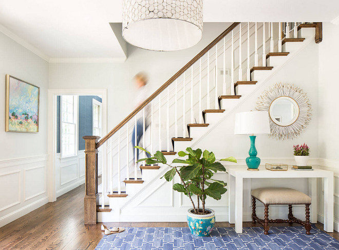 Blue and white foyer. Foyer with blue and white decor. Foyer with blue and white accents. Blue and white rug is from Madeline weinrib. #Foyer #Blueandwhite #Decor #Blueandwhitedecor Jamie Keskin Design.