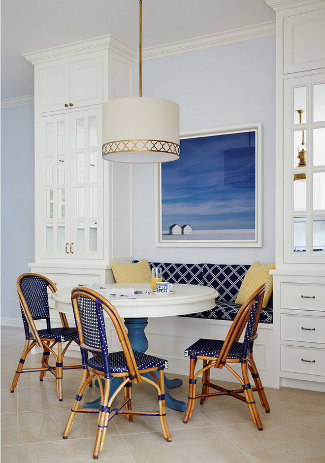 Breakfast Nook with bench flanked by cabinets. Andrew Howard Interior Design.
