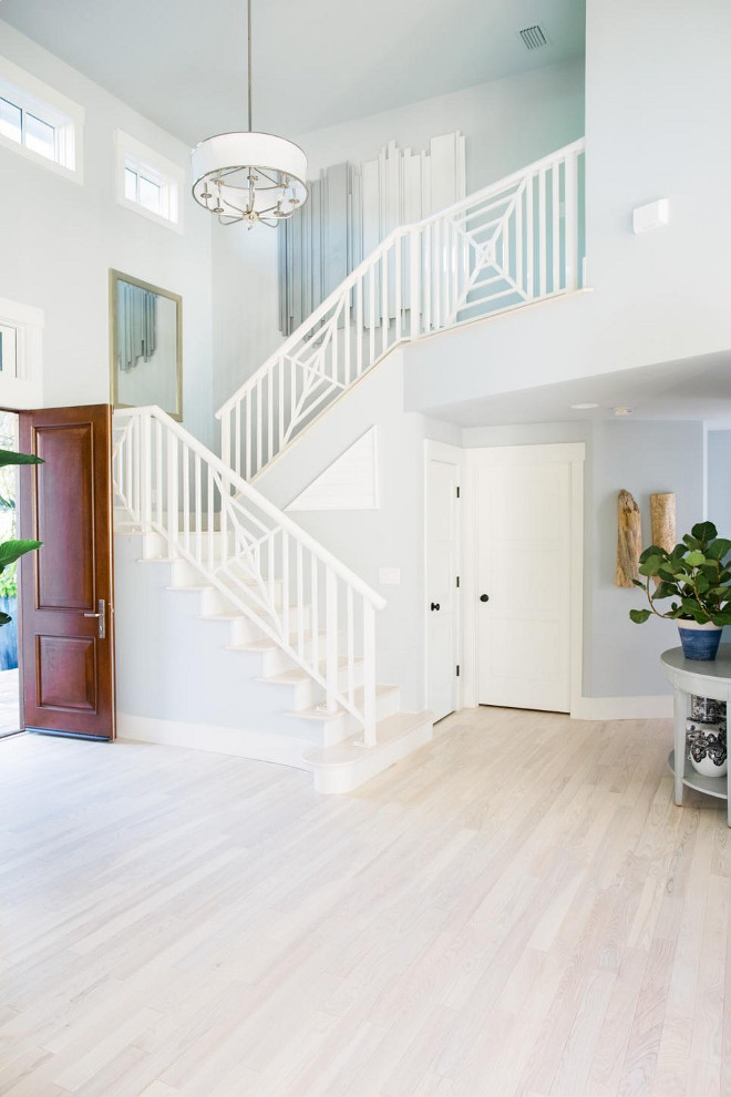 HGTV Dream Home 2016 Foyer. The foyer's chic geometric staircase railing to the upper level gives a hint of the home's luxe design motif and overall design approach.
