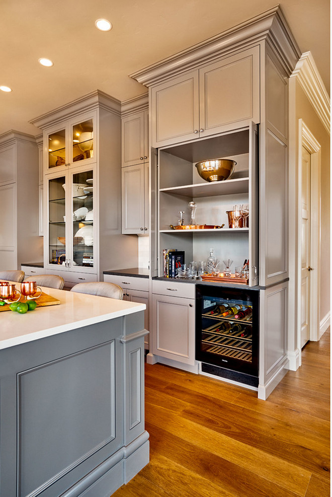 Kitchen Bar Cabinet. Kitchen bar cabinet design. Beautiful gray kitchen with bar cabinet and beverage fridge. #Kitchen #Bar #Cabinet