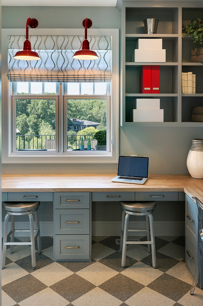 Kitchen Built-in Desk. Built-in desk placed in the pantry. Kitchen pantry with built in desk. Built in desk pantry kitchen. Great home office with red gooseneck barn lights, gray cabinets and white and gray harlequin tiled floor. #BuiltinDesk #kitchen #pantry Spacecrafting Photography.