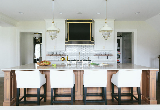 Kitchen Hood. Black hood with brass. Custom black hood with brass flanked by white cabinets and open shelves. #kitchen #Hood #BlackHood #Blackhoodbrass #Brasshood #Kitchenhood Kate Marker Interiors.