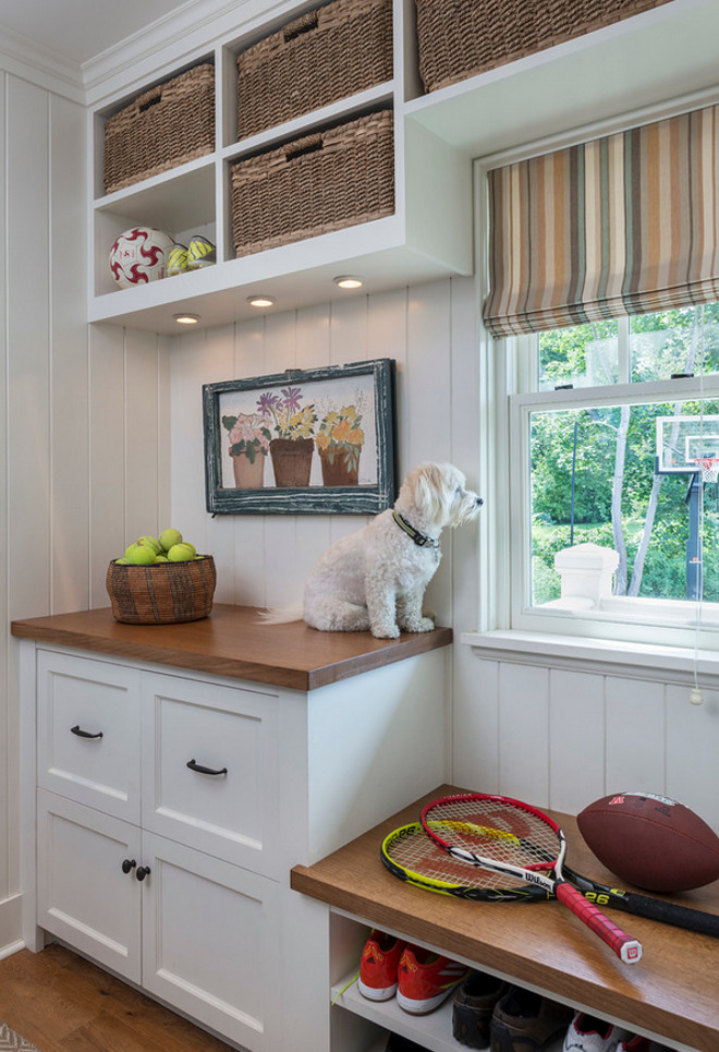 Mudroom Cabinet with counter. Making the most of small mudroom with cabinet, countertop and bench. #MudroomCabinet #MudroomCabinetcounter #Mudroom Taste Design Inc.