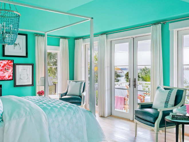 Teal Bedroom. The majestic teal for the master bedroom walls was also used for the ceiling, which helps give the well-detailed space a cozy feel.