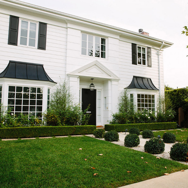 White home exterior with black shutters paint color, Classic White exterior with black shutters paint color, White home exterior with black shutters paint color ideas #Whiteexterior #Whitehome #Whitehomeexterior #WhitehomeexteriorPaintColor #blackshutters blackshutterspaintcolor Waterleaf Interiors