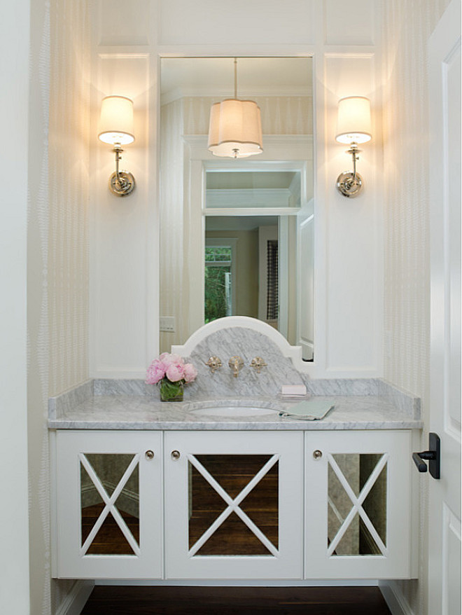Bathroom mirrored vanity, A gorgeous mirrored vanity with marble countertop and wall mount bathroom faucet are the showstopper features of this powder room Bathroom mirrored vanity ideas, Bathroom mirrored vanity photos, Bathroom mirrored vanity #Bathroom #mirroredvanity #Bathroommirroredvanity Divine Custom Homes Bria Hammel Interiors