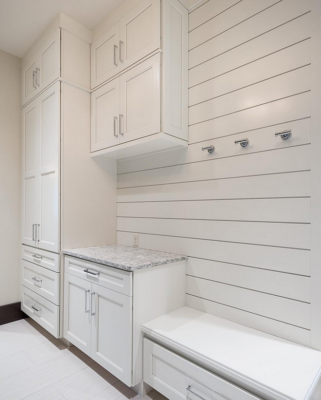 Mudroom. Mudroom inset cabinet ideas. All white mudroom with inset cabinets and shiplap walls. #Mudroom #Mudroominsetcabinet #Insetcabinet #plankwalls #shiplap #mudroomshiplap Sita Montgomery Design Cameo Homes Inc.