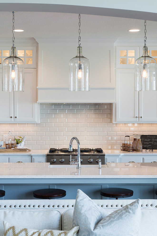 Beveled Subway Tile Backsplash. White kitchen cabinets with white countertop combining with Beveled Subway Tile Backsplash. Beveled Subway Tile Backsplash #BeveledBacksplash #WhiteBeveledBacksplash #WhiteBeveledTile #KitchenBeveledTileBacksplash Spacecrafting Photography.
