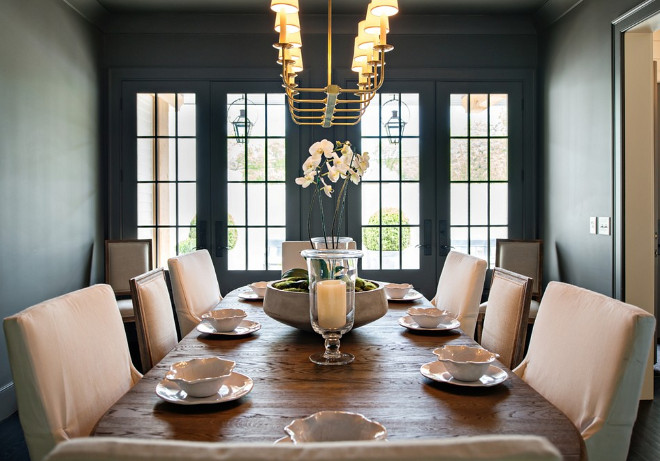 Dark Gray Dining Room Dining room painted in dark gray Lightning is 10 light Linear Pendant from the E.F. Chapman Branched Chandelier #Darkgray #DiningRoom #darkgraydiningroom Allard Ward Architects