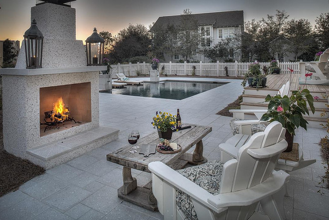 Outdoor fireplace by pool. #outdoorfireplace #pool 30avibe Photography.