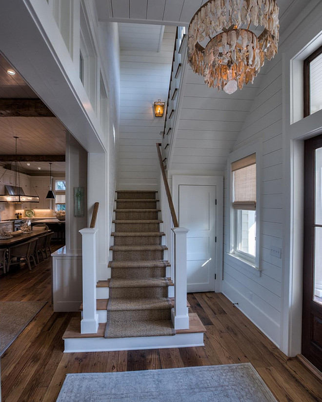Plank walls foyer. Foyer with plank walls and reclaimed plank floors. Plank walls. Shiplap plank walls. Foyer white plank walls #Foyerplankwalls #Foyershiplapwalls #whiteplankwalls 30avibe Photography.
