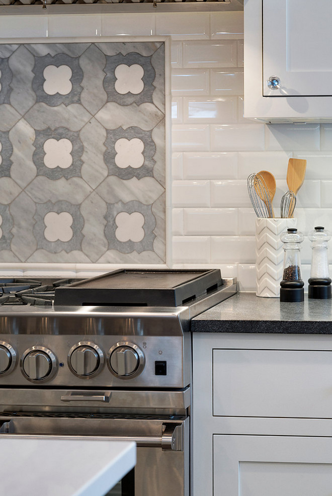 Range accent tile backsplash. The accent tile above the cooktop is a marble mosaic. It is from the Talya Collection Irene PR90051 at MN Tile. #Rangeaccenttilebacksplash Grace Hill Design