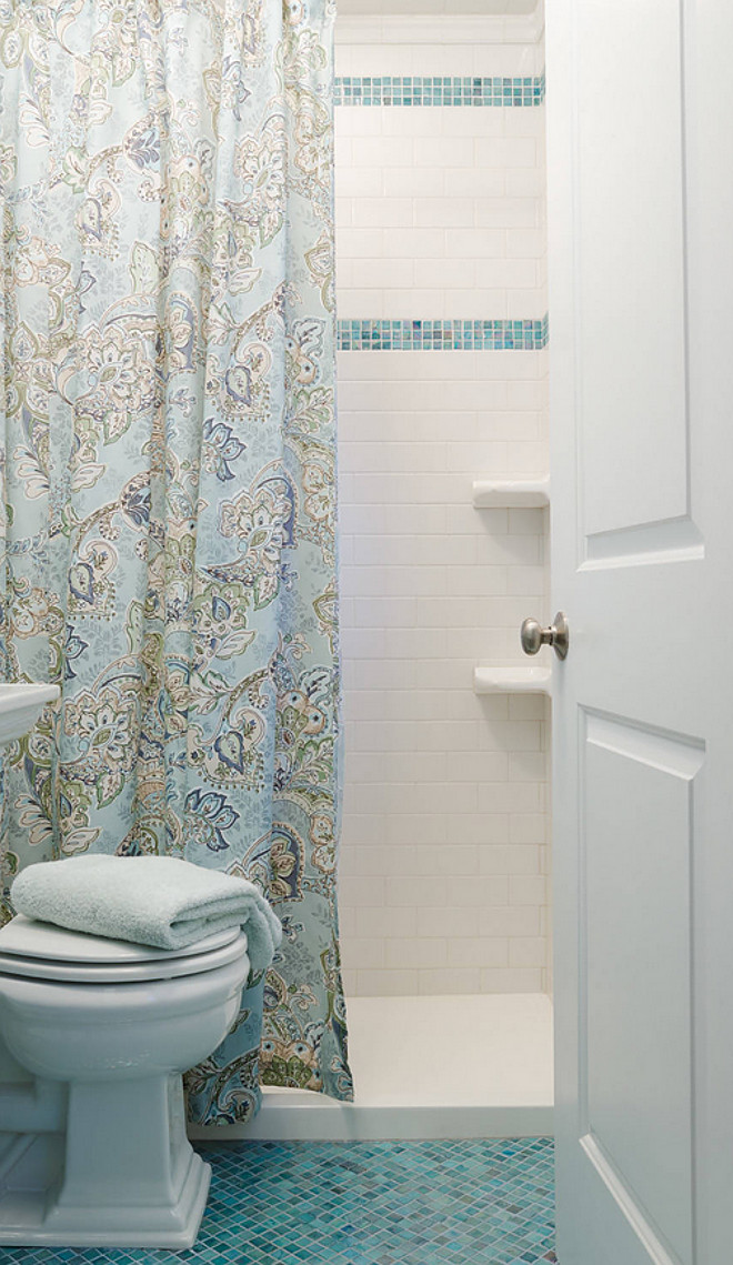 Small Bathroom Decorating Ideas. Having a limited space should never limit your creativity when design it. Here, the interior designer used a 3/4" x 3/4" square blue tiles on the floor and used a combination of classic white subway tiles with blue tiles on the shower wall. Similar Tiles: "Blue Copper Glass Tile Blend 3/4" x 3/4" by Glass Tile 4 Less" on Amazon - $7.98 + $9.93 shipping. #SmallBathroom #SmallBathroomDecoratingIdeas #SmallBathroomFloors #SmallBathroomFlooring #SmallBathroomWallTiles #SmallBathroomTiles #SmallBathroomIdeas #SmallBathroom 