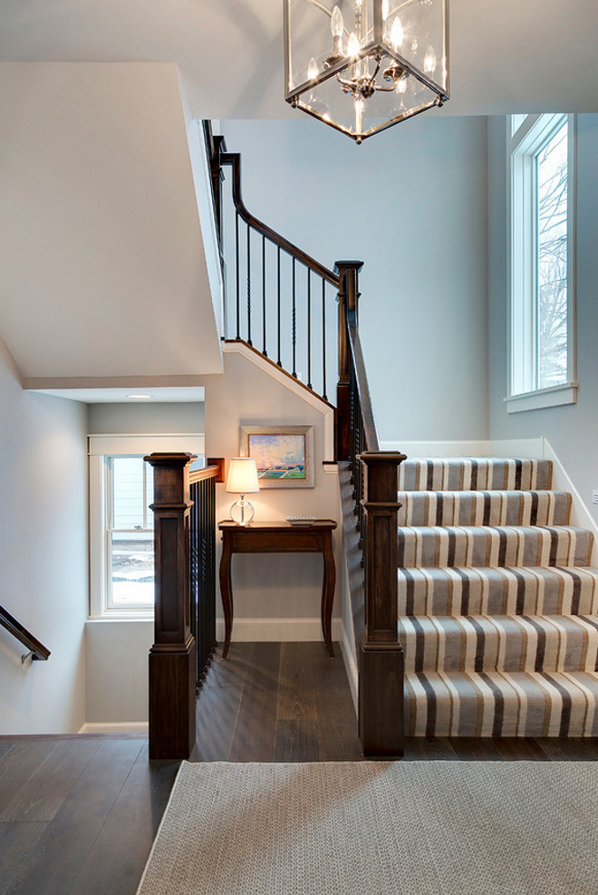 Stair Runner. Striped Stair Runner. Neutral Striped Stair Runner. Foyer with dark hardwood floors and Striped Stair Runner. #StripedStairRunner #StairRunner Grace Hill Design