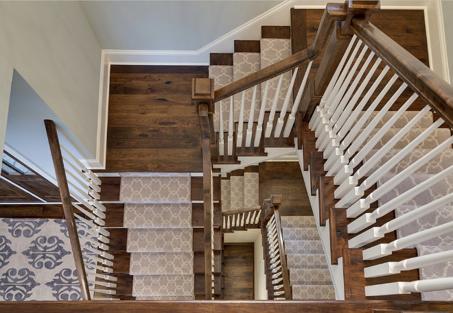 The staircase features a gray Moroccan-style stair runner Stair runner, How to change the look of your stairway with a gray Moroccan-style stair runner #Stairwayrunner Design by Stonewood, LLC.
