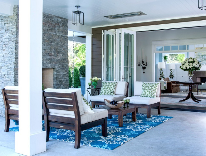 Patio space off the kitchen and the entry. The bi-fold doors open to the entry and the living room giving the client a larger entertaining space when needed. The infra red heaters in the ceiling make this a year round space. Johnston Home LLC