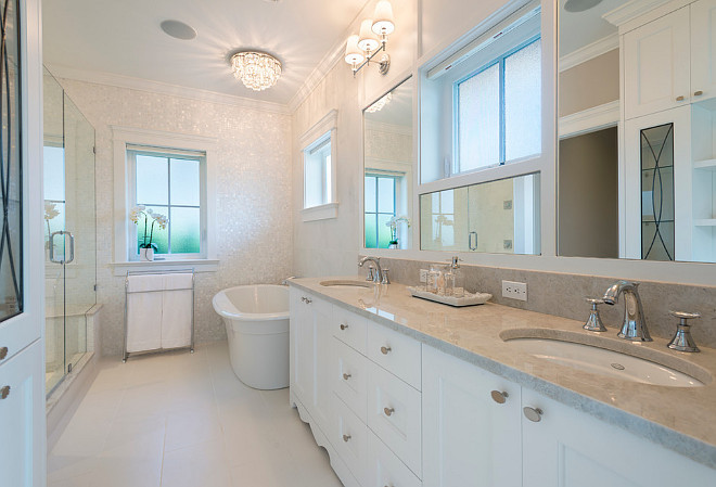 Bathroom. Master Bathroom. Neutral master bathroom. Neutral bathroom with crystal faucet handles and undermounted sinks. #Bathroom #NeutralMasterbathroom #Neutralbathroom Kemp Construction. Sarah Gallop Design Inc. 